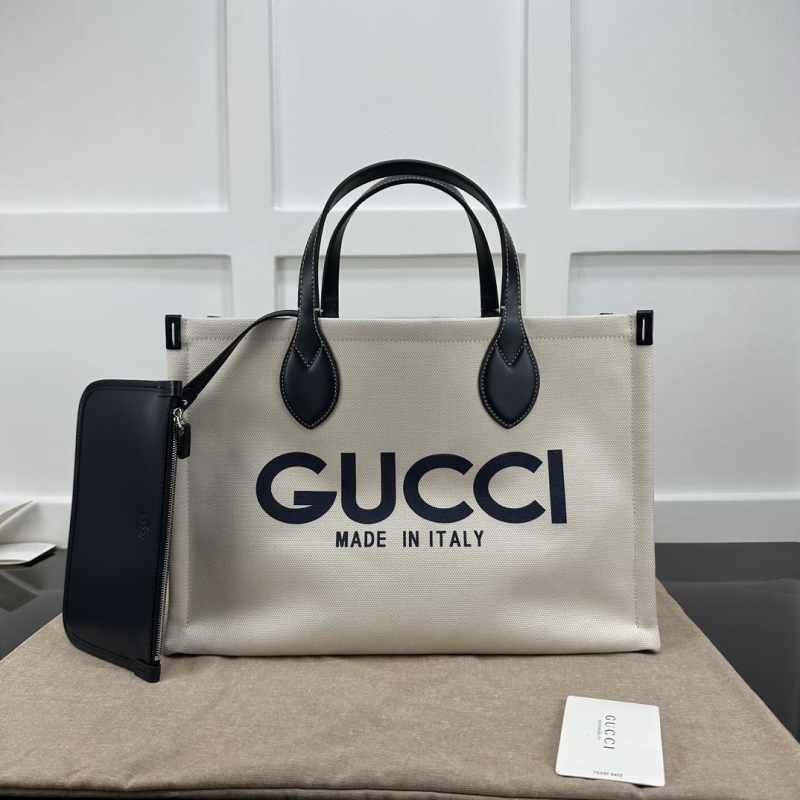G*u*i shopping bags